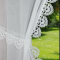 Tieback trimmed curtain